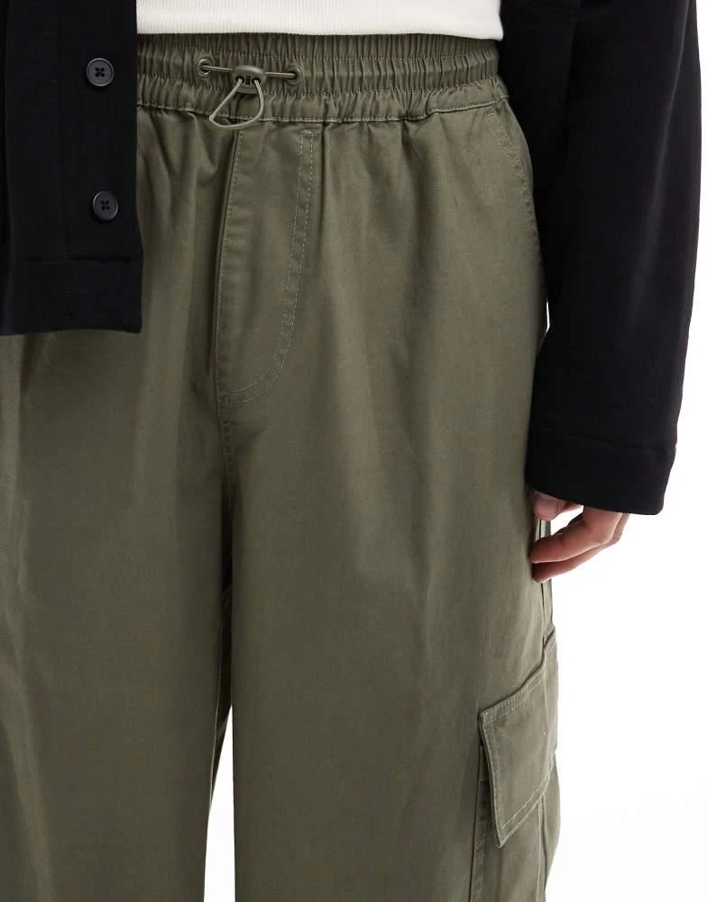 ASOS ASOS DESIGN super baggy cargo trousers with elasticated waist in washed green 3