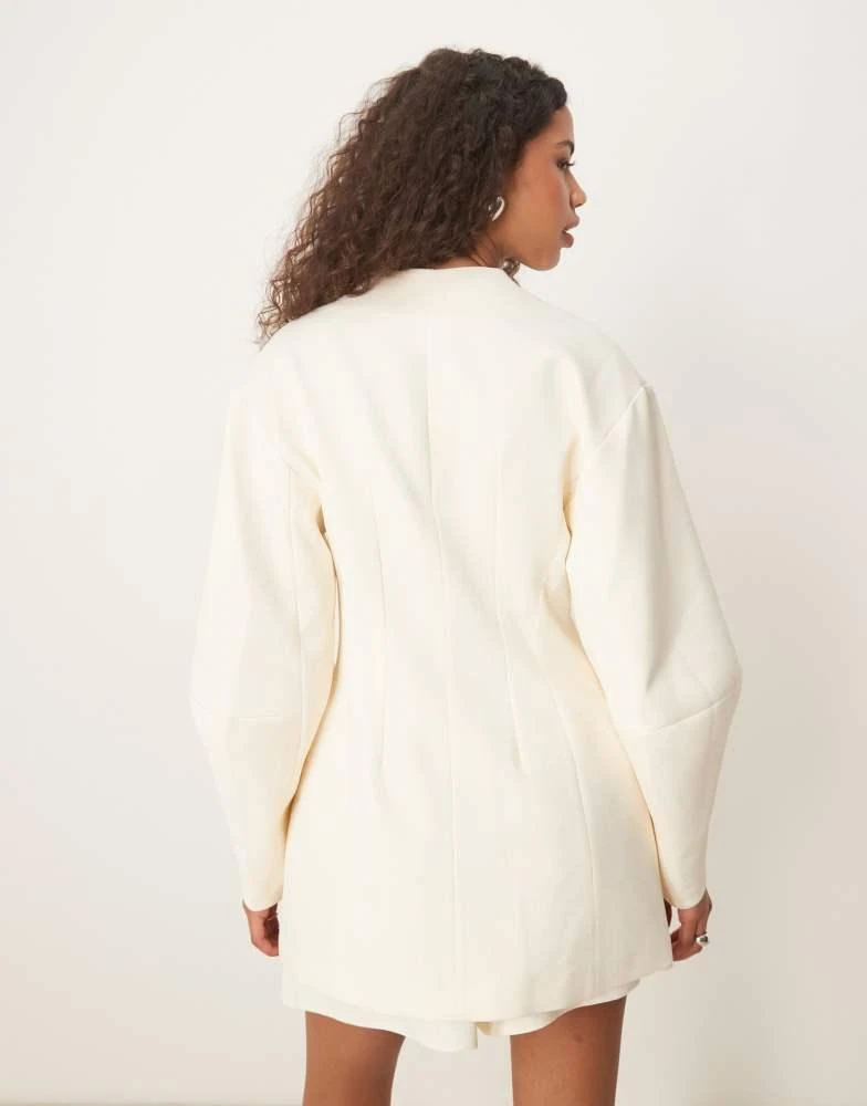 ASOS ASOS DESIGN cocoon sleeve collarless blazer in buttermilk 4
