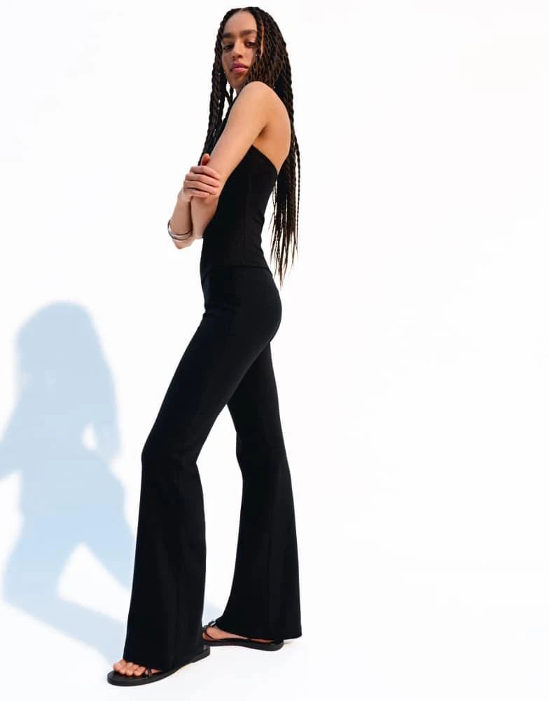 Bershka Bershka flared trousers in black 4