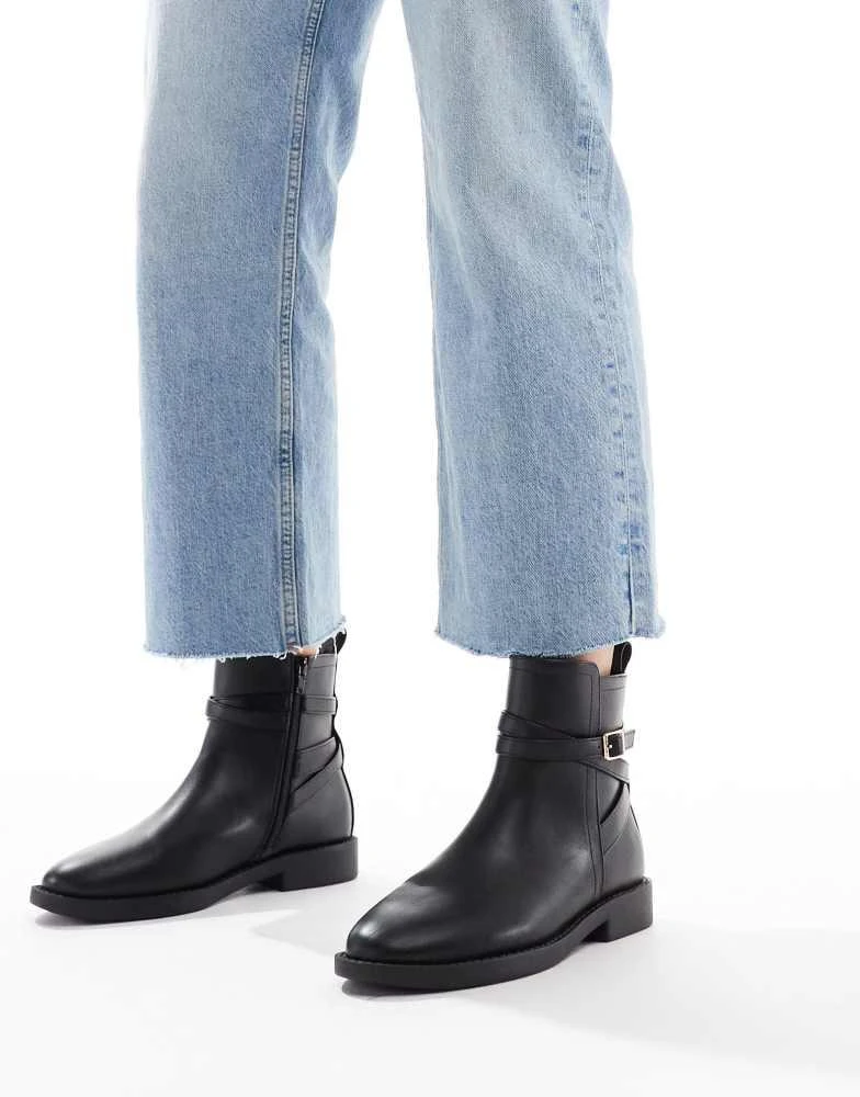 ASOS ASOS DESIGN Wide Fit Aria flat chelsea boots with buckle detail in black 1