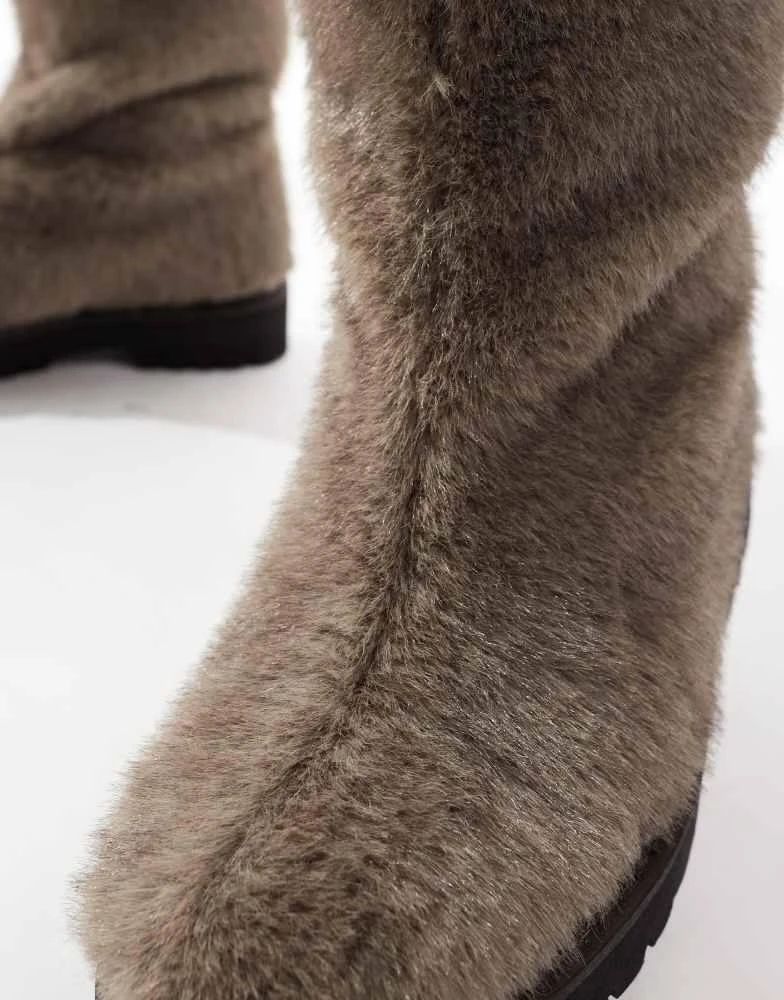 ASOS ASOS DESIGN pull on boots in brown faux fur 4