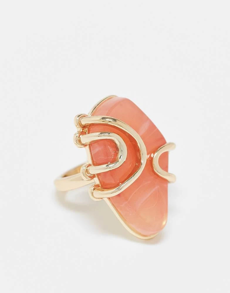 ASOS ASOS DESIGN Curve ring with faux semi precious pink stone in gold tone 1