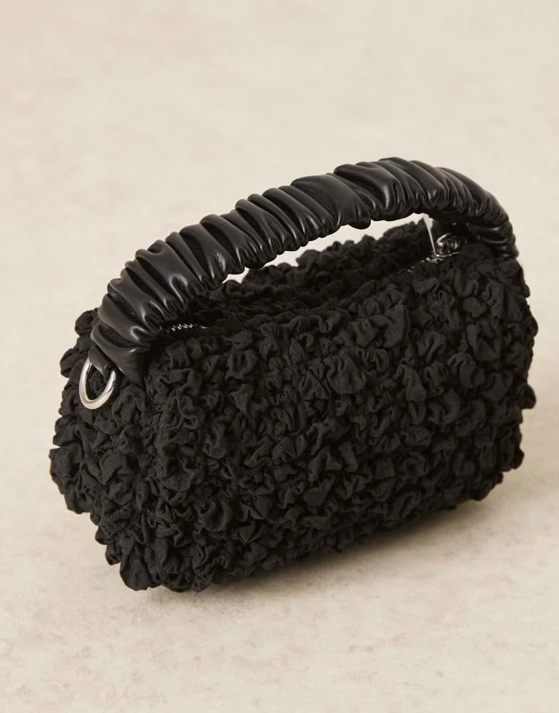 ASOS ASOS DESIGN ruched handle textured grab bag with detachable chain crossbody strap in black 3