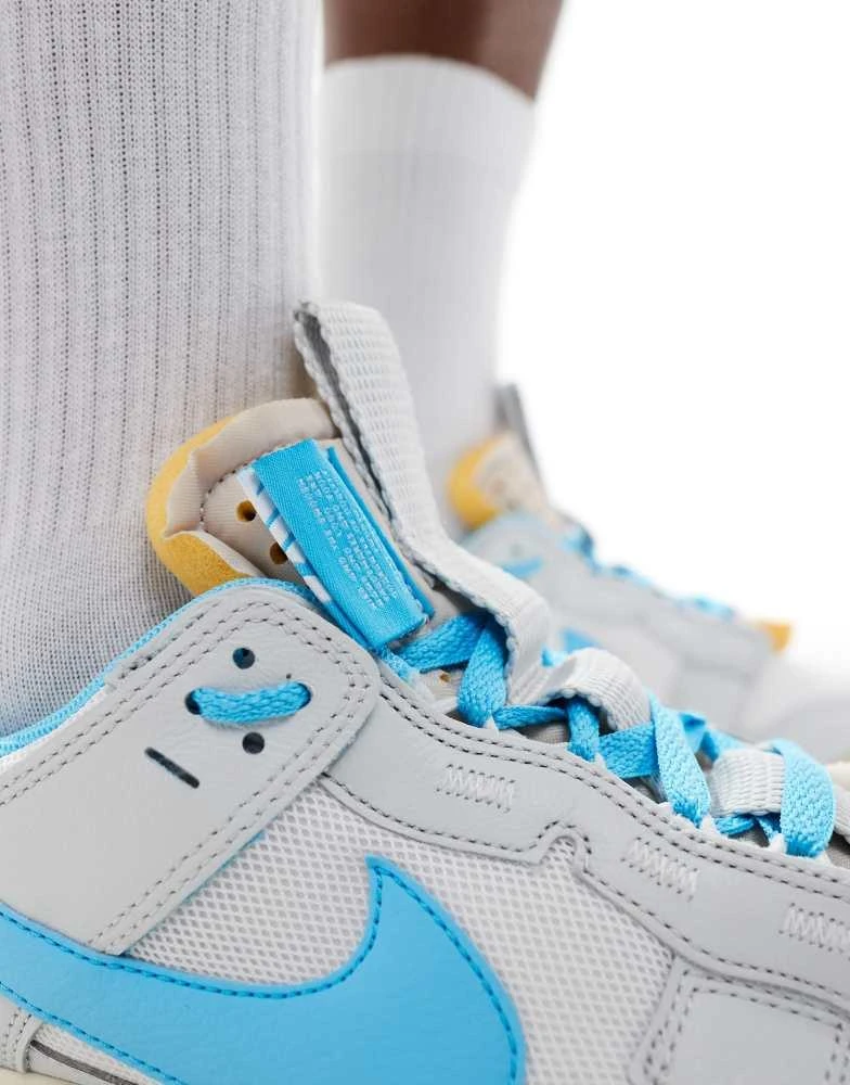 NIKE Nike Dunk Low jumbo trainers in white and blue 4
