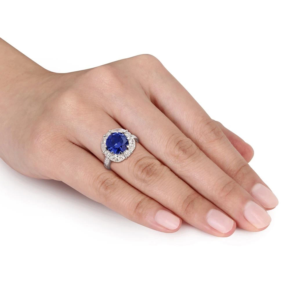Mimi
Max Created Forever 4 3/4ct TGW Created Blue Sapphire 2ct TW Lab-Grown Diamond Halo Ring Sterling Silver 2