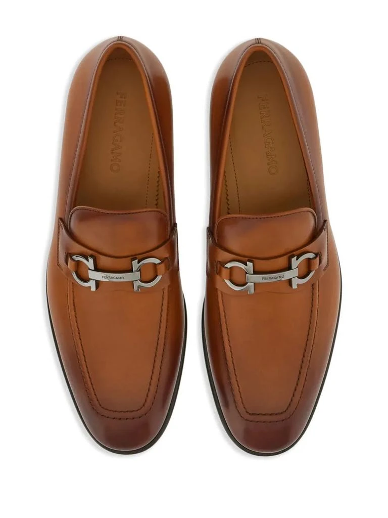 Shop Ferragamo Gancini-Plaque Leather Loafers in BROWN on  display picture 3