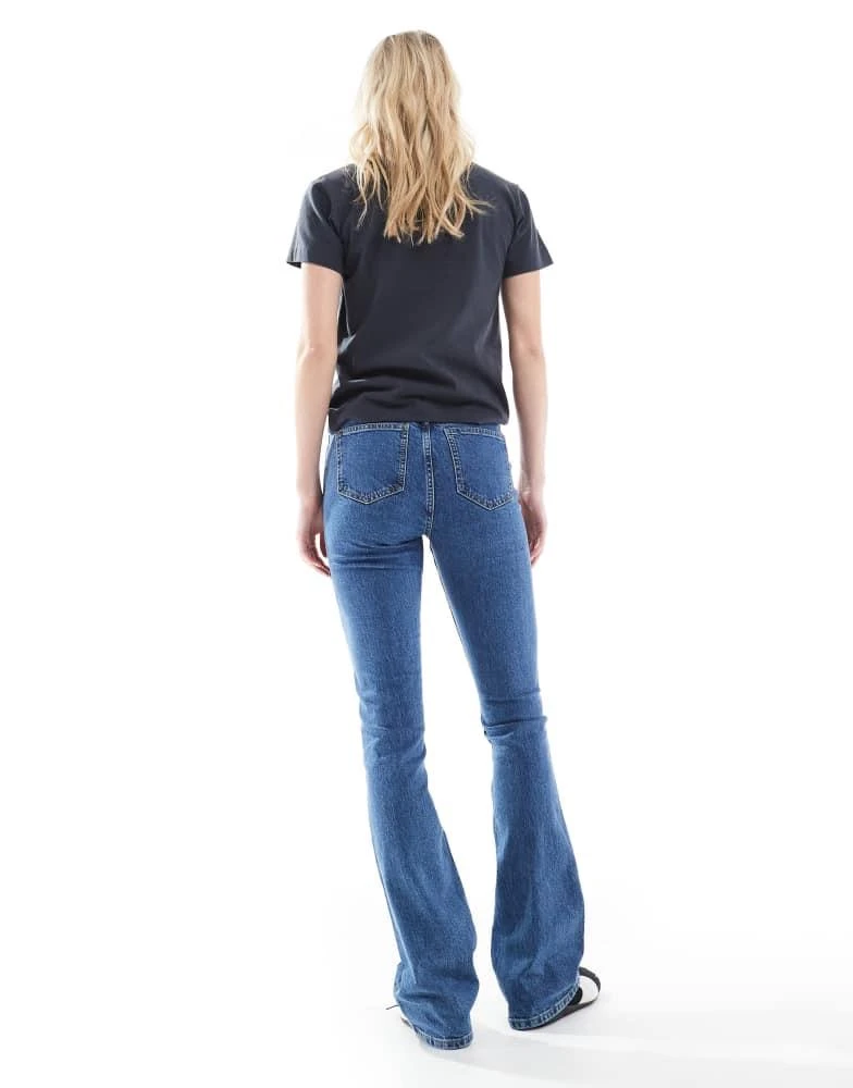 ASOS ASOS DESIGN Tall mid rise flare jeans in authentic dark midwash 2