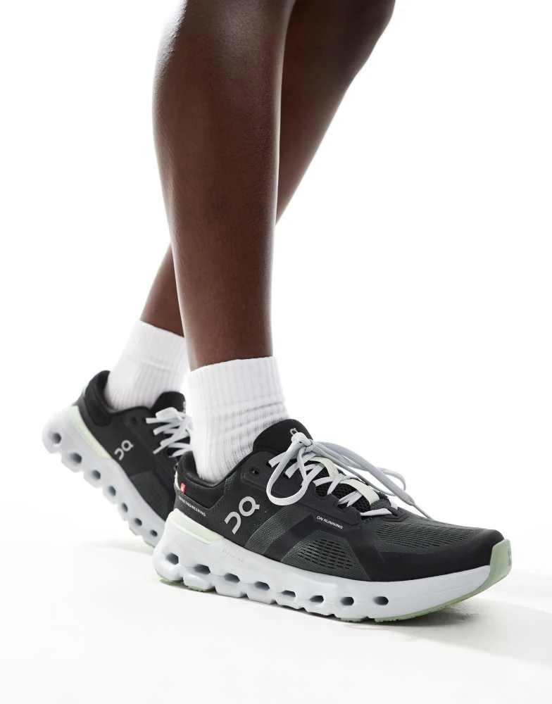 On ON Cloudrunner 2 running trainers in black and lime green 1