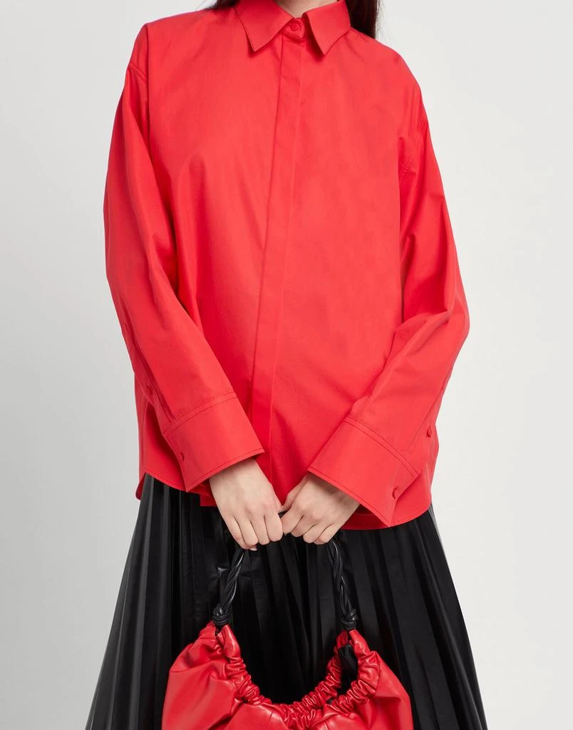 Valentino Solid color shirts
blouses 4