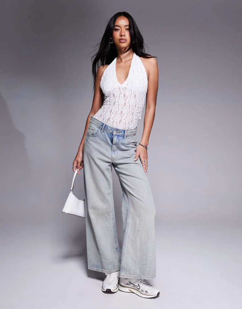Shop ASOS DESIGN lace plunge halter neck bodysuit in white on Sale at  BeyondStyle  Get 31% Off ASOS DESIGN lace plunge halter neck bodysuit in  white with Limited-Time Flash Deals, Exclusive