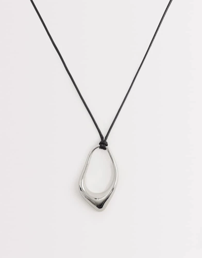 ASOS ASOS DESIGN long corded necklace with abstract pendant in silver tone