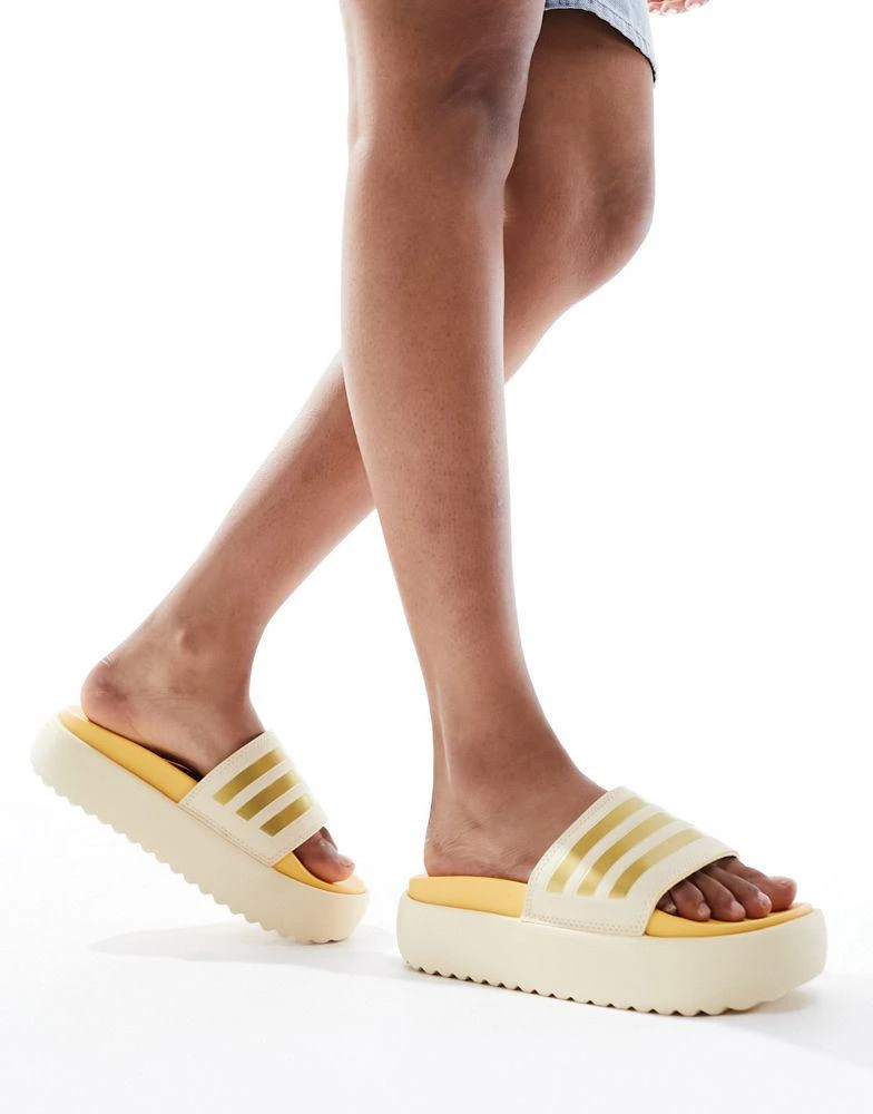 Adidas adidas Training Adilette platform sliders in sand and gold 1
