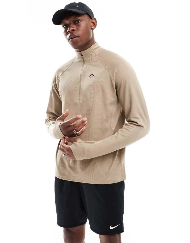 NIKE Nike Running Trail 1/4 zip sweatshirt in beige 1