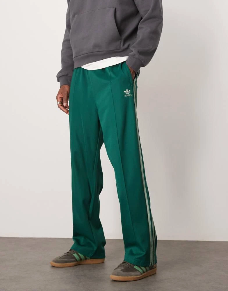 Adidas adidas Originals Firebird Loose track pants in green 2
