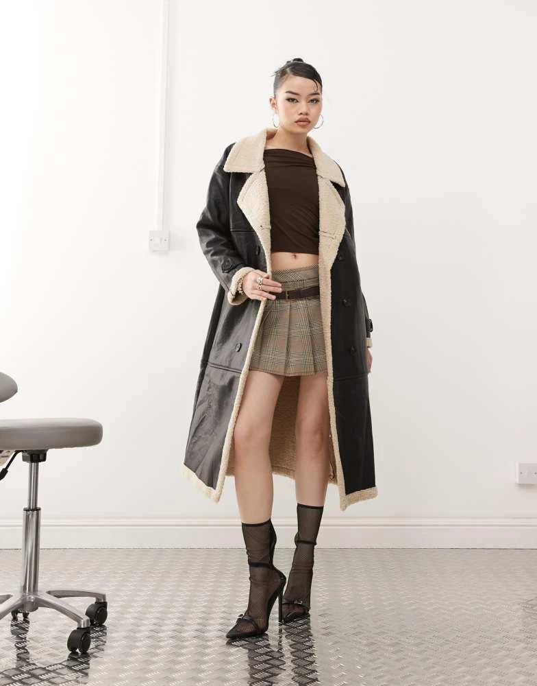 Princess Polly Princess Polly leather look contrast faux shearling button front longline coat in black and beige 1