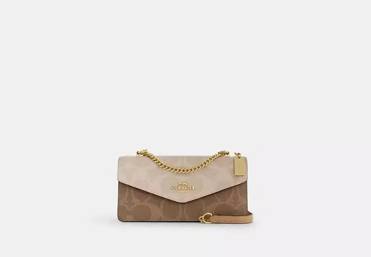 Klare Envelope Crossbody Bag In Blocked Signature Canvas