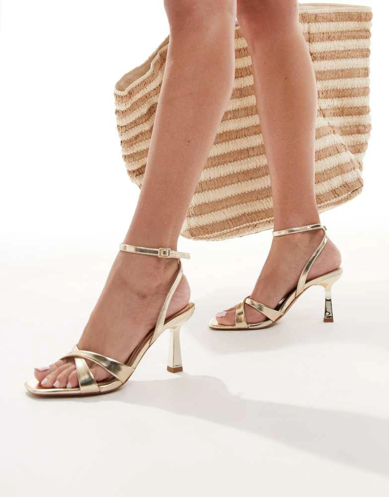 Stradivarius Stradivarius Wide Fit heeled sandal in gold 1