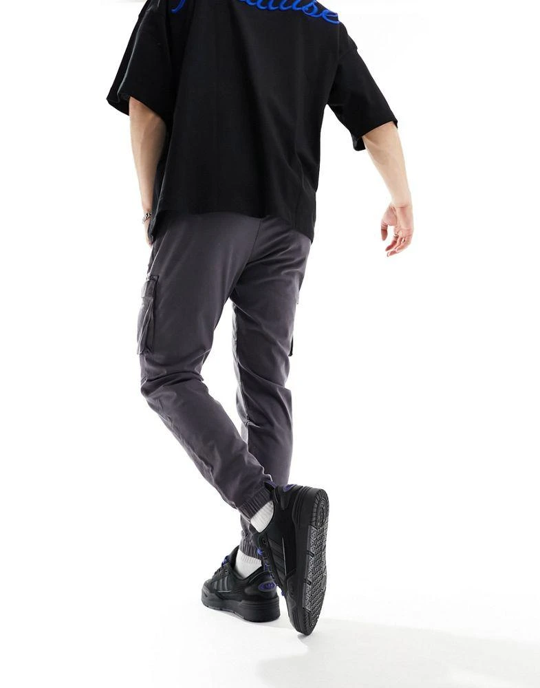 HOLLISTER Hollister front pocket skinny fit cargo joggers in dark grey 3