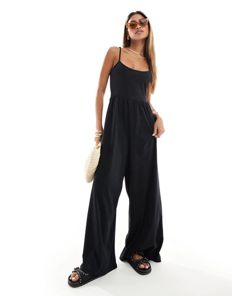ASOS ASOS DESIGN scoop neck strappy wide leg jumpsuit in black 1