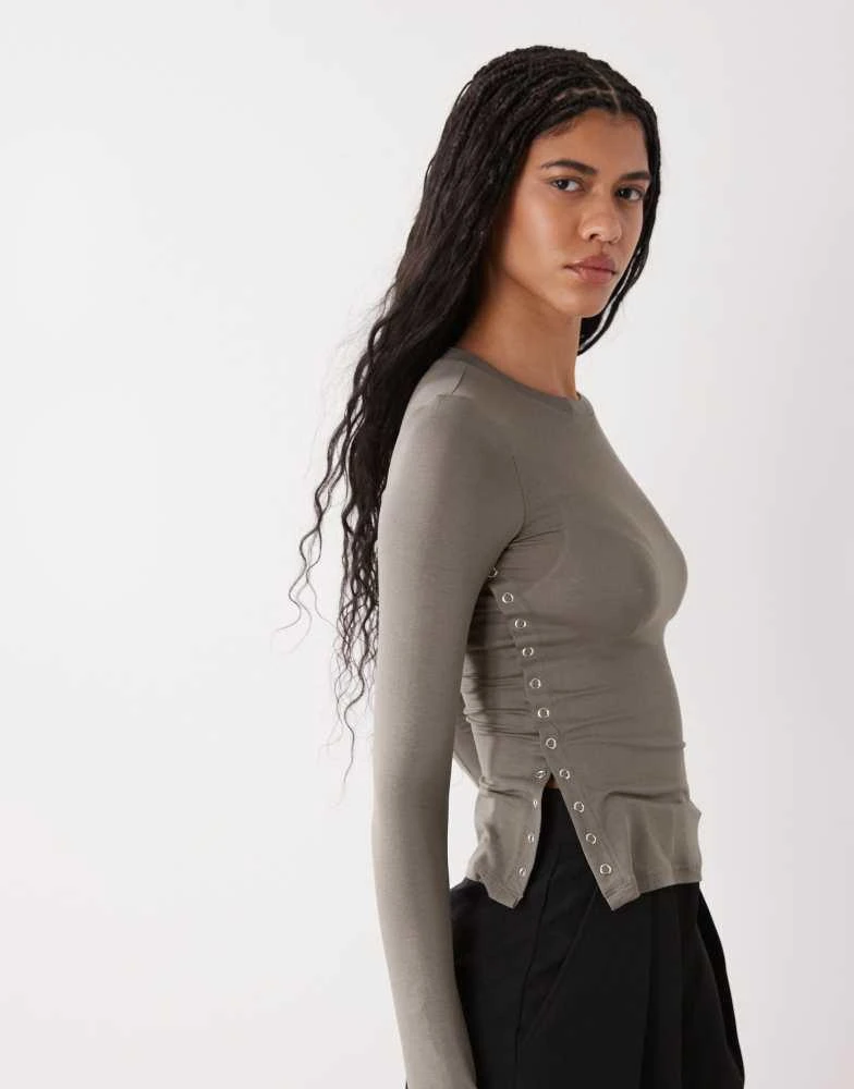 Weekday Weekday long sleeve fitted top with button detailing and asymmetric hem in grey