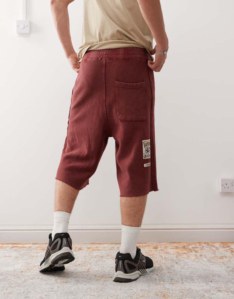 AAPE Aape by A Bathing Ape loose fit heavyweight knitted shorts in dark burgundy with embroidered side stripe