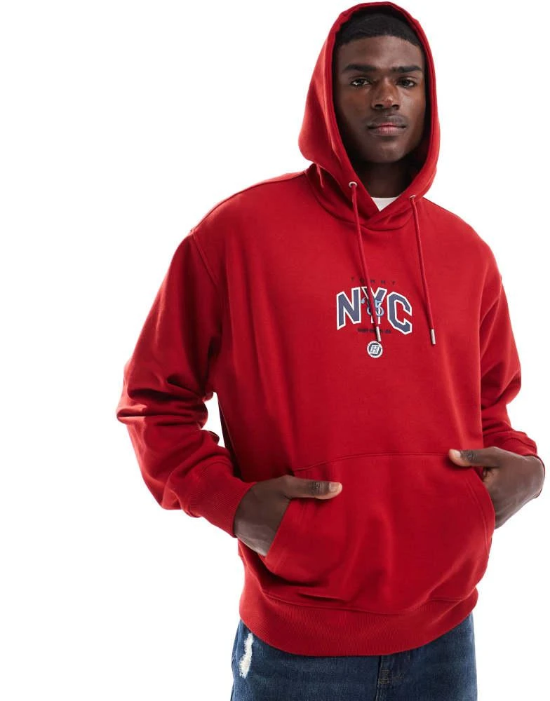 Shop Tommy Jeans Game Day logo hoodie in red on Sale at