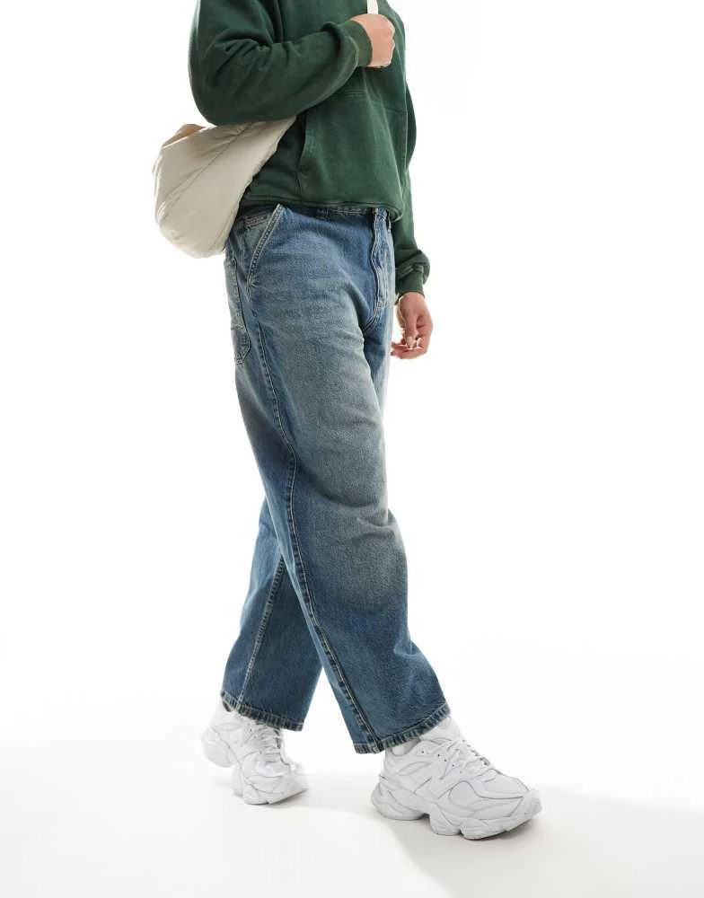 Pull&Bear Pull&Bear skater fit jean in blue with yellow cast 4