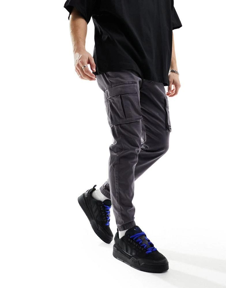 HOLLISTER Hollister front pocket skinny fit cargo joggers in dark grey 4