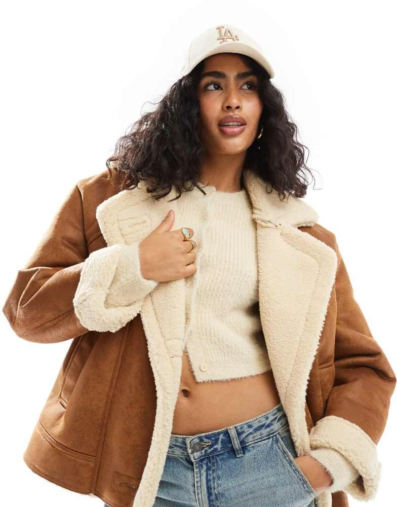 Bershka Bershka oversized contrast shearling jacket in brown 1