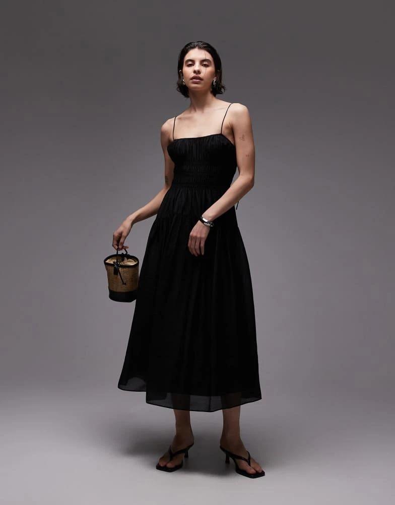 Shop & Other Stories milkmaid midi dress with smocking and spaghetti straps  in black on Sale at BeyondStyle  Get 40% Off & Other Stories milkmaid midi  dress with smocking and spaghetti