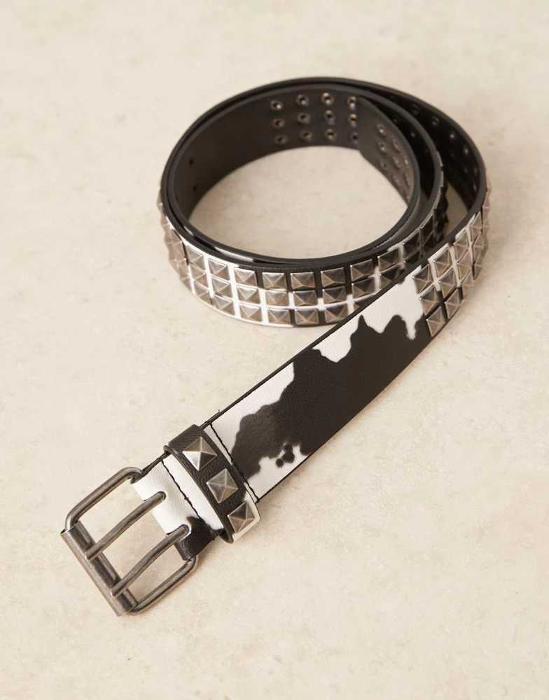 ASOS ASOS DESIGN cow print studded belt in faux leather 2