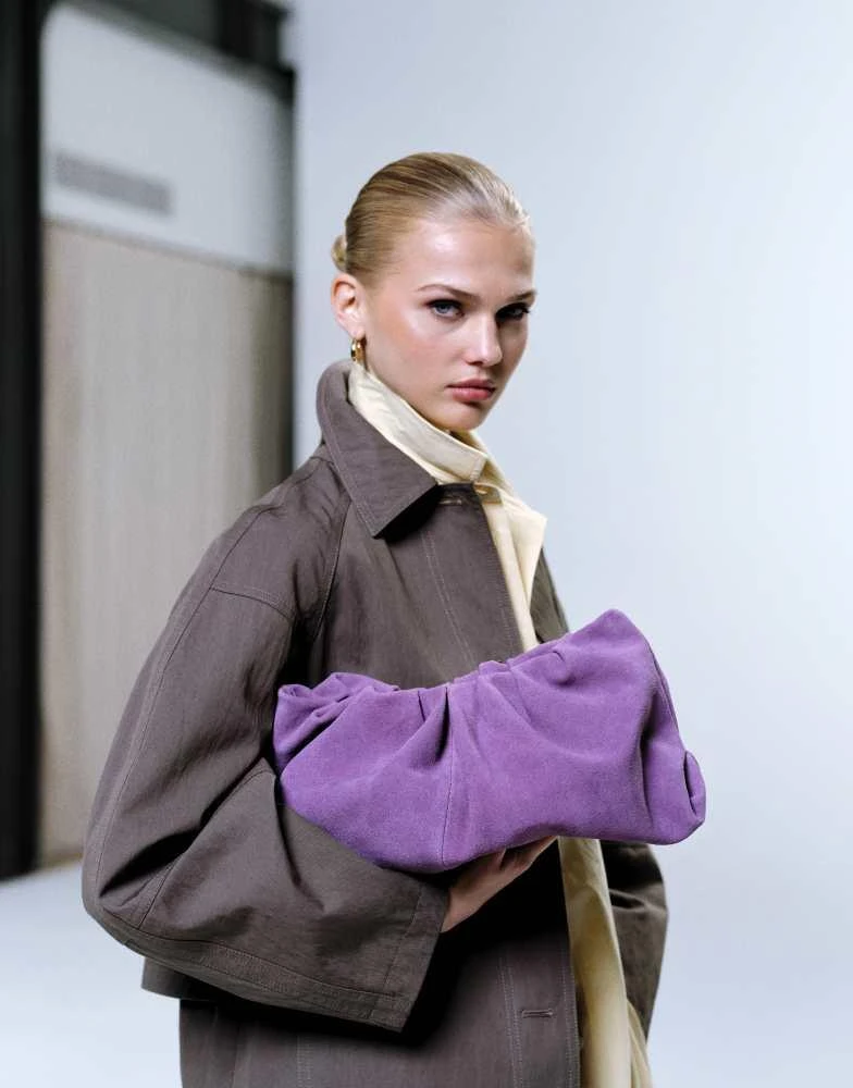 ASOS ASOS DESIGN suede cloud clutch bag in violet