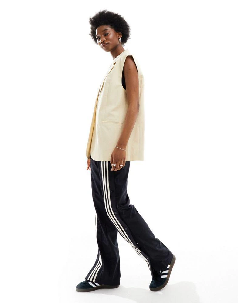 ASOS ASOS DESIGN sleeveless tailored blazer with linen in buttermilk 3