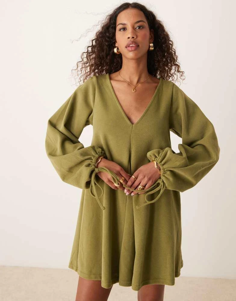 ASOS ASOS DESIGN supersoft v-neck flare hem skirt mini dress with tie sleeve in olive 4