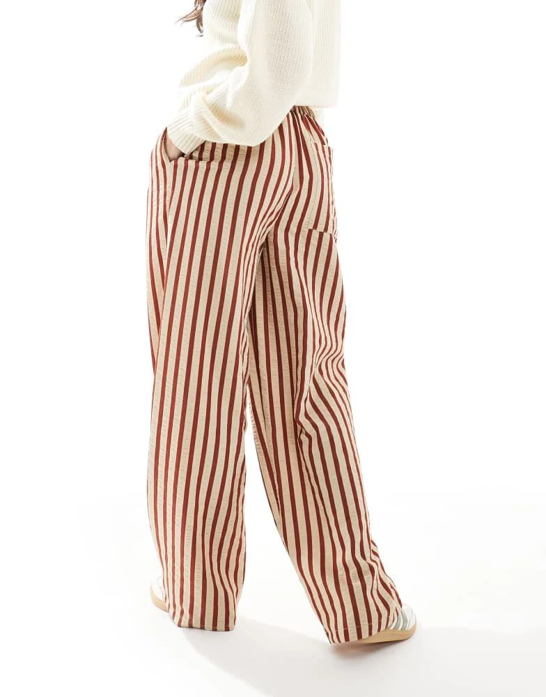 ASOS ASOS DESIGN straight leg seersucker trousers in rust stripe 2