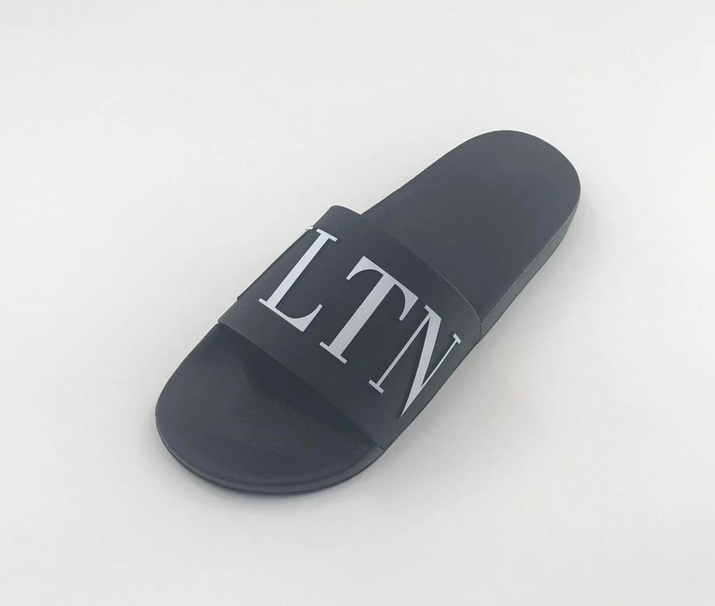 Shop Valentino Black VLTN Logo Pool Slides on Sale at  display picture 1