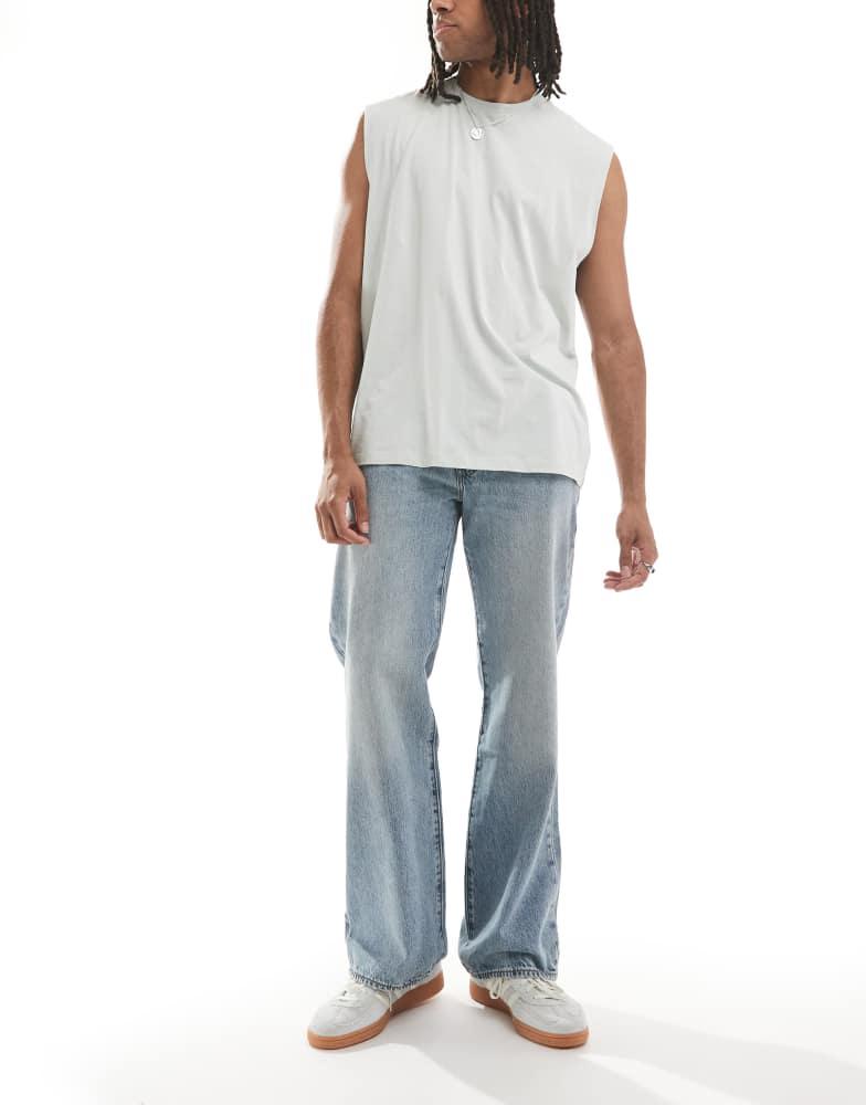 Shop Levi's 567 relaxed flare jeans in light wash on Sale at