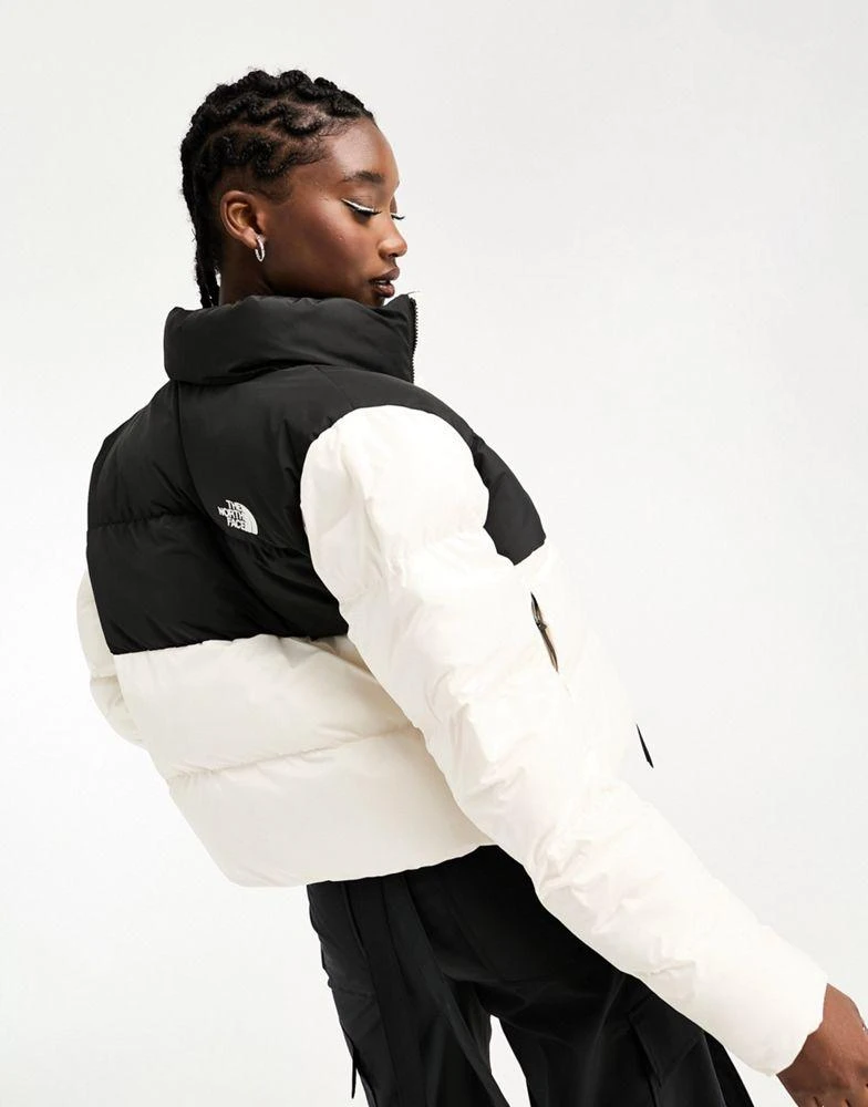 The North Face The North Face Saikuru cropped puffer jacket in cream and black Exclusive at ASOS 2