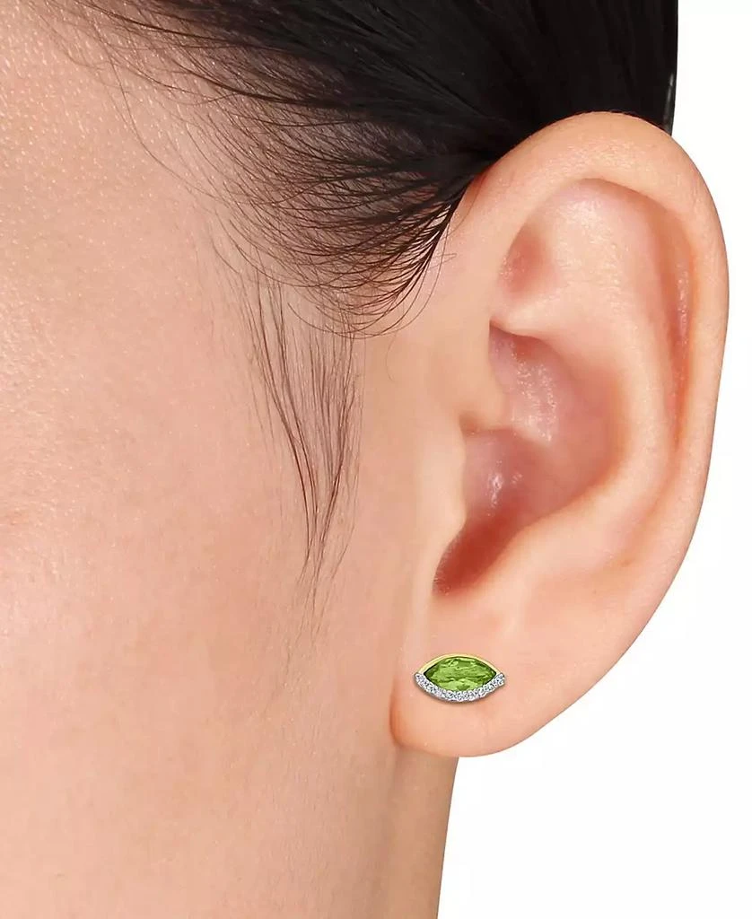 Macy
s Blue Topaz (1/4 ct. t.w.) 
Diamond (1/10 ct. t.w.) Marquise Stud Earrings in 14k Gold (Also in Garnet, Amethyst, 
Peridot) 2