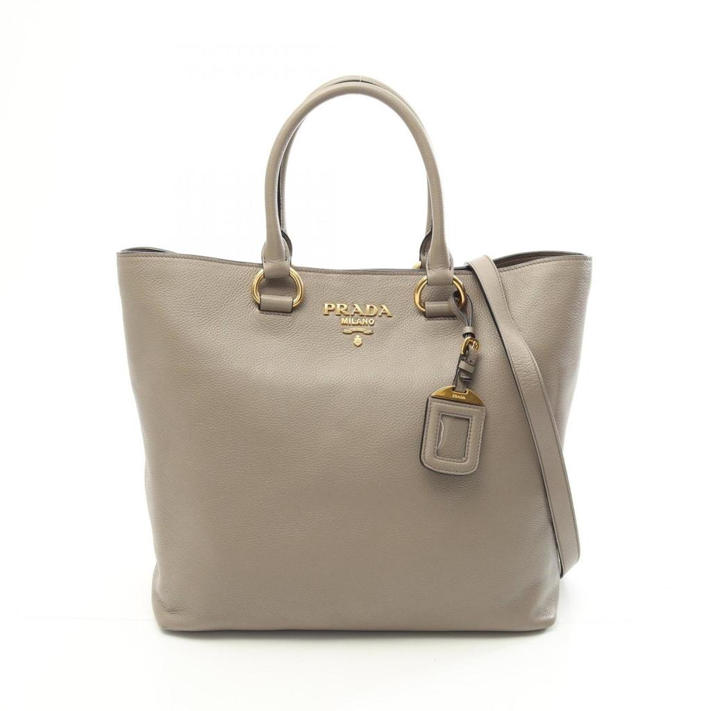 Prada PRINTED CALF HAIR CLUTCH - Handbags - BeyondStyle
