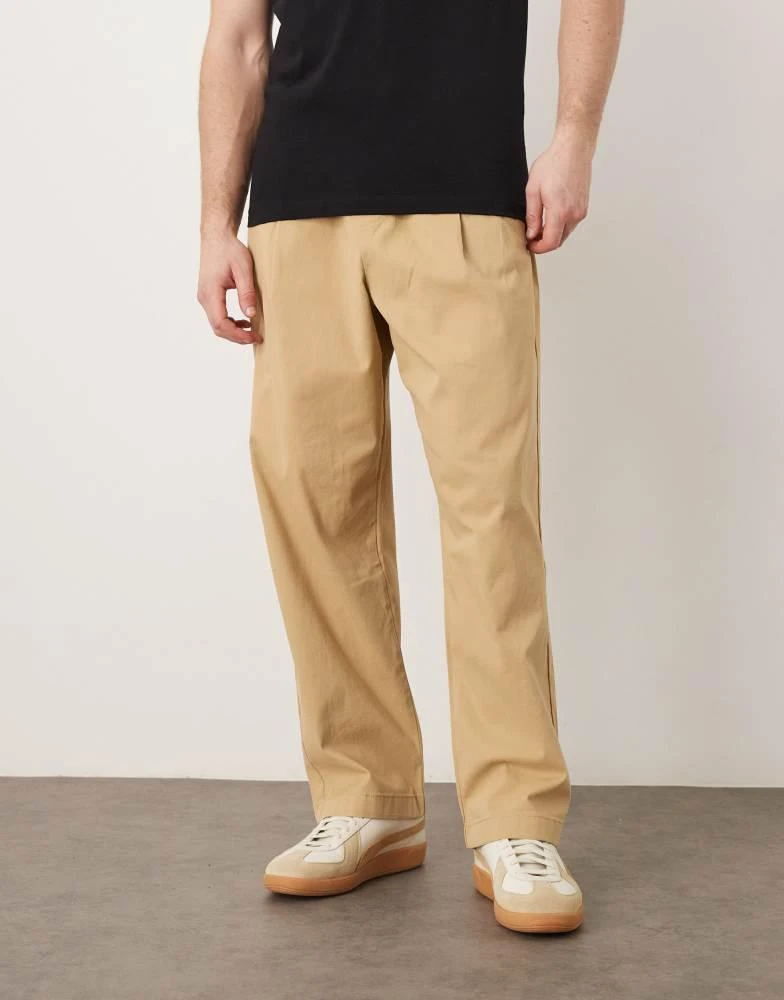 ASOS ASOS DESIGN relaxed tapered pull on trousers in beige with pleats