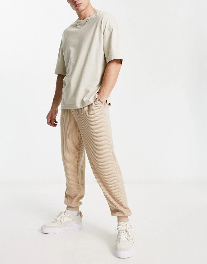 ASOS ASOS DESIGN oversized joggers in beige brushed rib texture 1