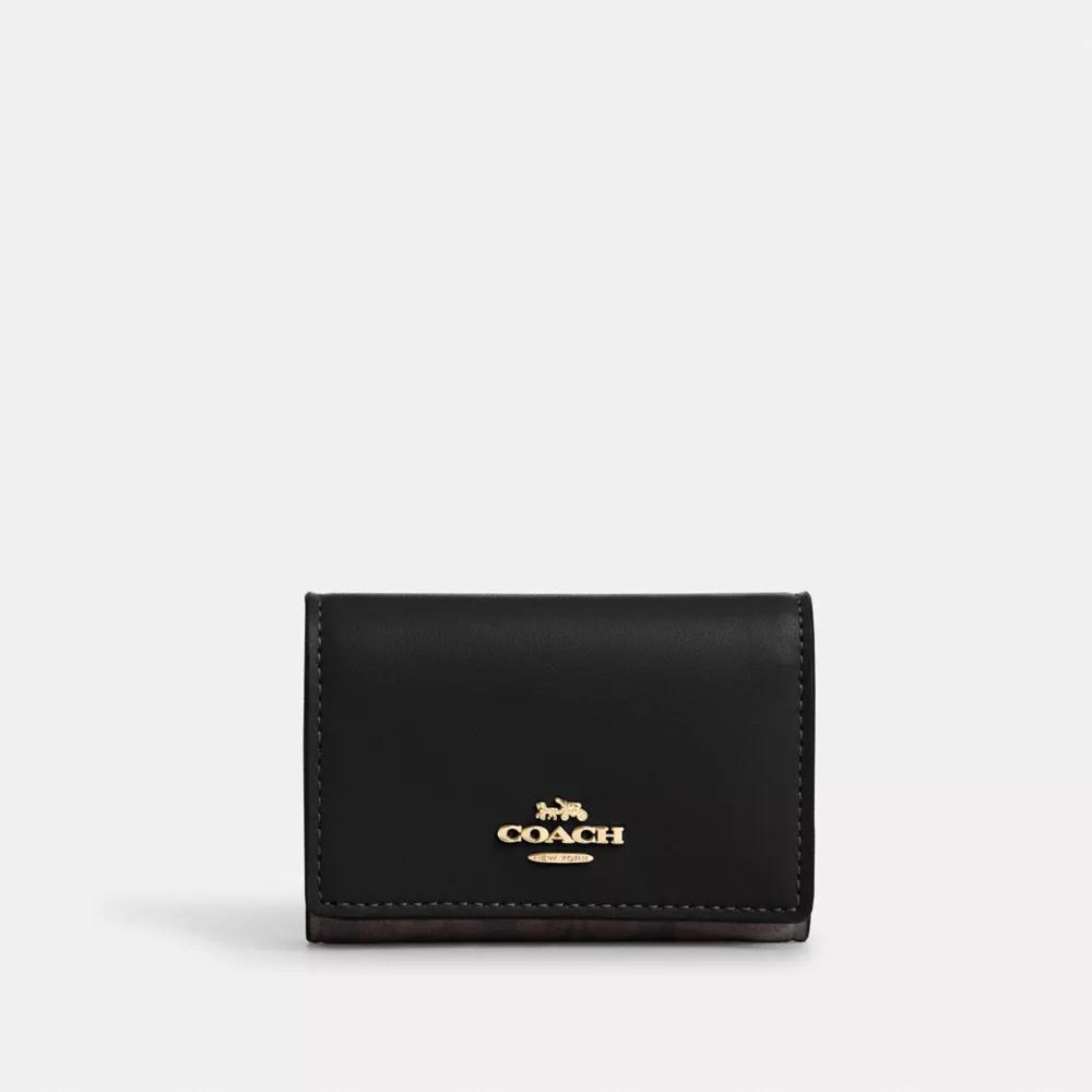 Coach Micro Wallet In Signature Canvas - Wallets - Compare