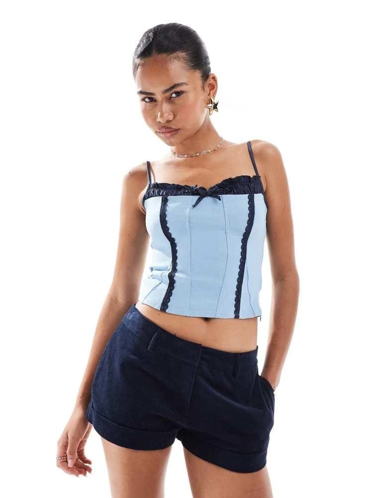 Motel Motel Exclusive alexa bow detail corset cami top in blue and navy 1