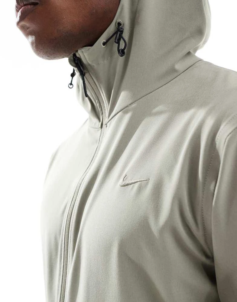 NIKE Nike Training Dri-FIT jacket in light khaki 4
