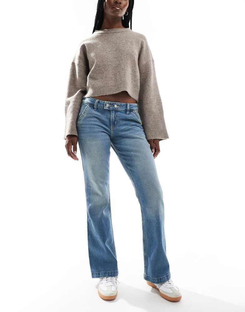 Hollister Hollister low rise relaxed bootcut jean in indigo Jeans BeyondStyle