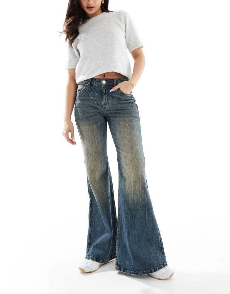 Bershka Bershka flared jeans in dirty wash blue 1