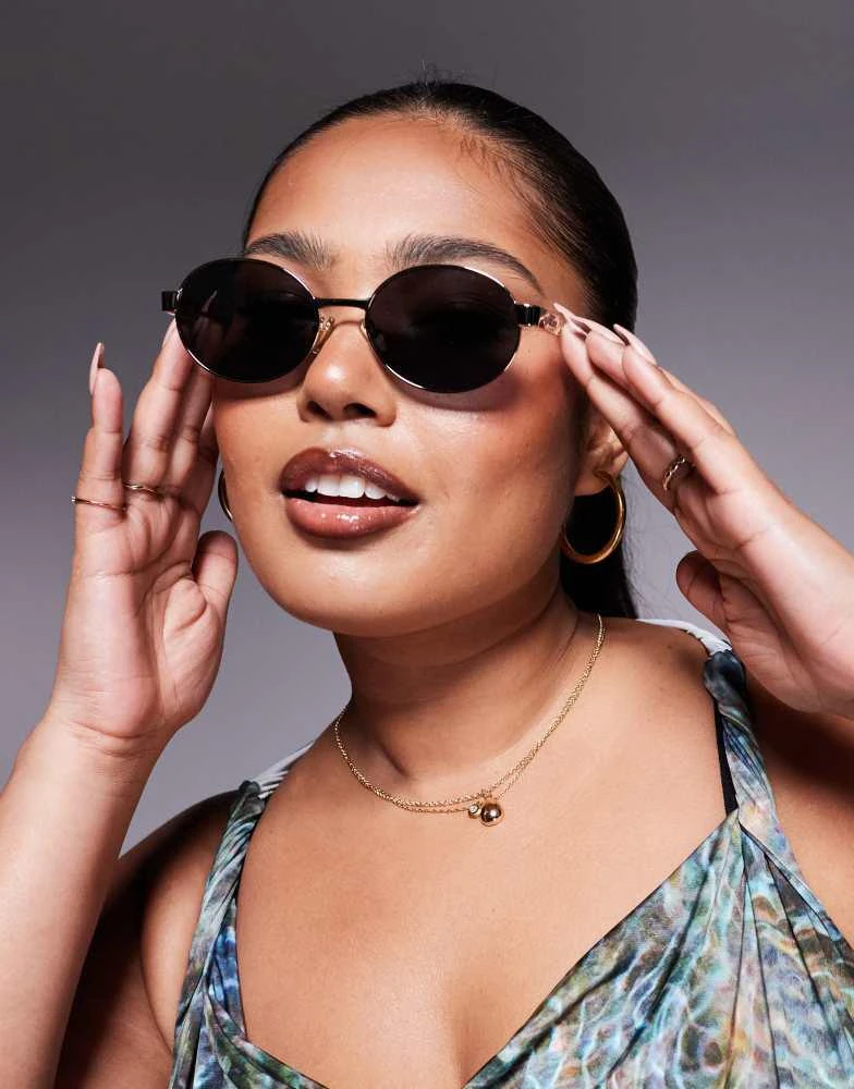 Quay Quay anyways slim round metal sunglasses in gold with black lens 1