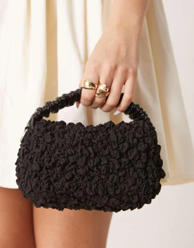 ASOS ASOS DESIGN ruched handle textured grab bag with detachable chain crossbody strap in black 1