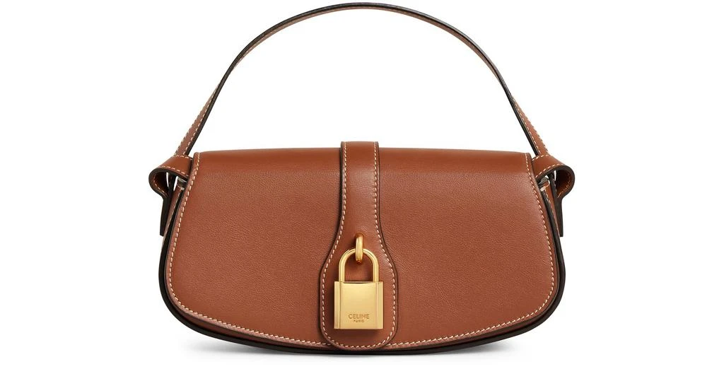 CELINE Tabou clutch on strap in smooth calfskin 1